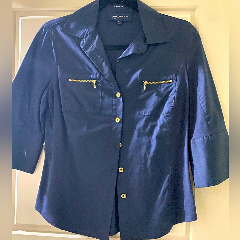 Jones New York small stretch navy top with gold pocket zippers.